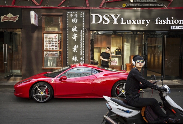 胡润财富报告说中国富豪人数在增加，亿万富翁人数已经超过美国。（Getty Images）