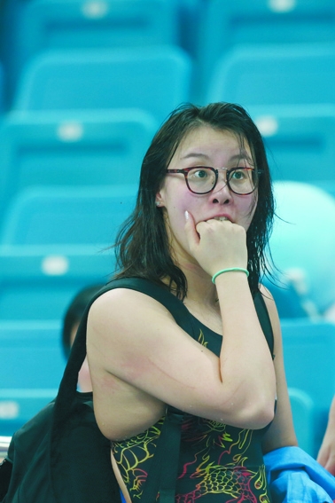 傅园慧在2016年北京国际泳联游泳世界杯女子50米自由泳决赛中竞赛后的反应。（Getty Images)