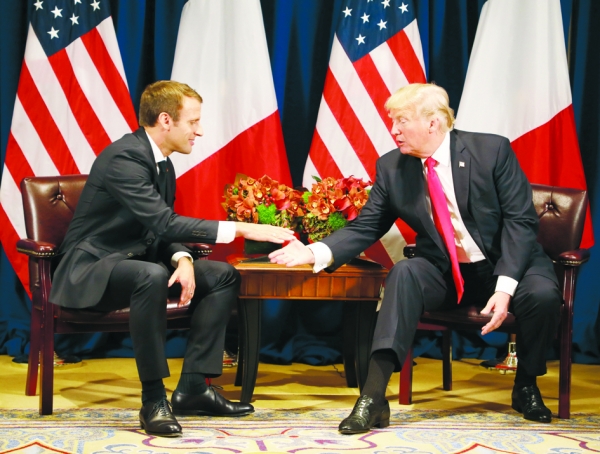2017年法国总统马克龙出访美国与川普会面。（AFP/Getty Images）