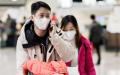 1月21日在北京大兴国际机场，头戴口罩的旅客。（AFP via Getty Images）