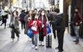 1月24日有中国游客行走在日本东京的大街上。（Getty Images）