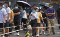 北京市感染中共病毒的人数持续上升，北京当局对民众展开大规模核酸检测。图为6月23日，北京某核酸检测点。（图片来源：GREG BAKER/AFP via Getty Images）