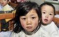 2011年2月13日，中国两名乞讨儿童被警方救出后在救援站。（Getty Images）