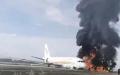 西藏航空一架空中巴士A319客机12日上午突然起火。（图片来源：视频截图）