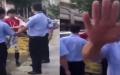 安徽芜湖一贫困大学生摆地摊赚学费遭城管殴打，还禁止拍照。（图片来源：视频截图）