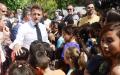 6月27日，马克龙走访了马赛Saint Andre La Castellane小学。（GUILLAUME HORCAJUELO/POOL/AFP via Getty Images）