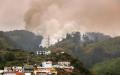 2023年8月19日，加那利特内里费岛拉马坦萨森林山坡上的野火失控。（DESIREE MARTIN/AFP via Getty Images）