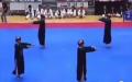 7月下旬在韩国举办的国际体育赛事上，中国选手集体用满清时代的僵尸造型亮相，还在场上大跳僵尸舞。（图片来源：视频截图）