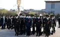 2023年3月12日，中共第十四届全国人大（NPC）的军方代表步行到大会堂参加人大第一次会议的第五次全体会议。(图片来源：Lintao Zhang/Getty Images)