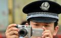 中国北京警察在拍照。（图片来源：Getty Images）