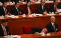 2024年3月11日，中国国家主席习近平（左）和国务院总理李强（中）出席第十四届全国人民代表大会闭幕会议。