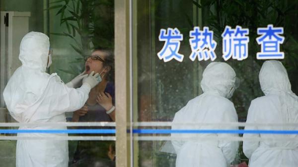 图为2009年5月在北京医院的流感检查（图片来源：Feng Li/Getty Images）