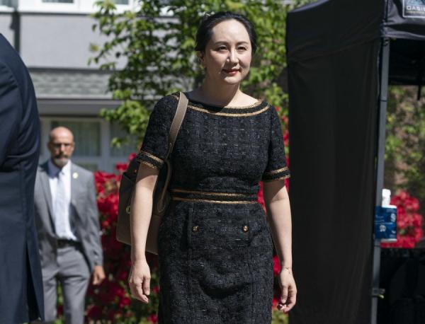 2020年5月27日，孟晚舟离开温哥华的家，前往 BC省最高法院。（图片来源：RichLam/Getty Images）
