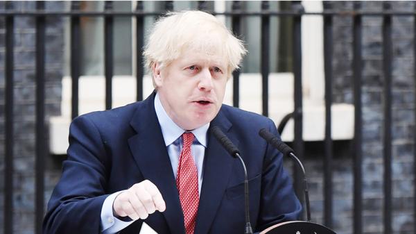 英国首相约翰逊表示愿为港人修改《移民法》。（AFP/Getty Images）