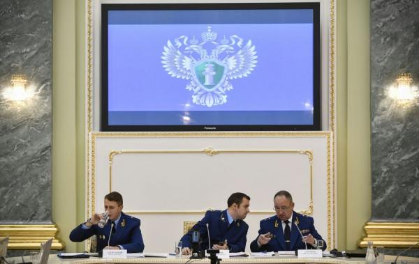 2018年11月19日，俄罗斯总检察院调查马格尼茨基死亡事件并做说明（图片来源：ALEXANDER NEMENOV/AFP via Getty Images）