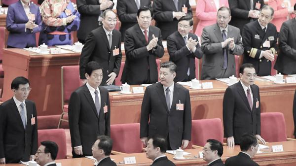 栗战书（前排左二）与习近平（前排右二）（Lintao Zhang/Getty Images）
