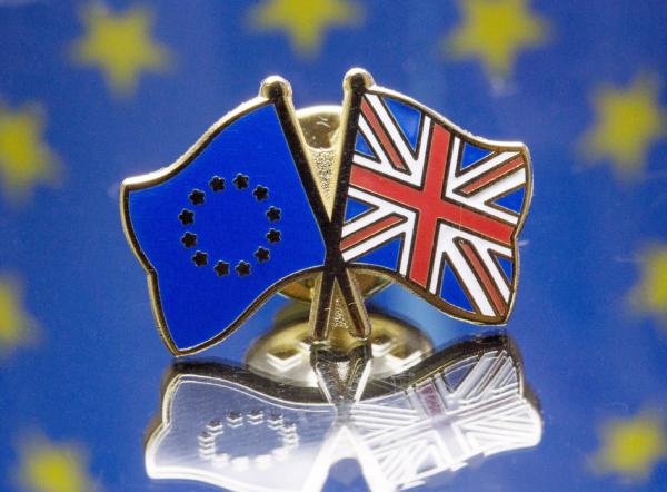 经过长期的艰苦谈判，英国和欧盟终于达成了历史性的脱欧贸易协定。（Dan Kitwood/Getty Images）