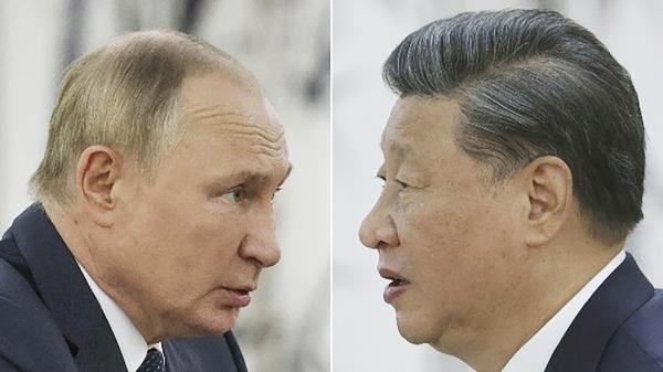 9月15日，普京和习近平在上合组织 (SCO) 领导人峰会期会晤。（ALEXANDR DEMYANCHUK/SPUTNIK/AFP/Getty Images） 