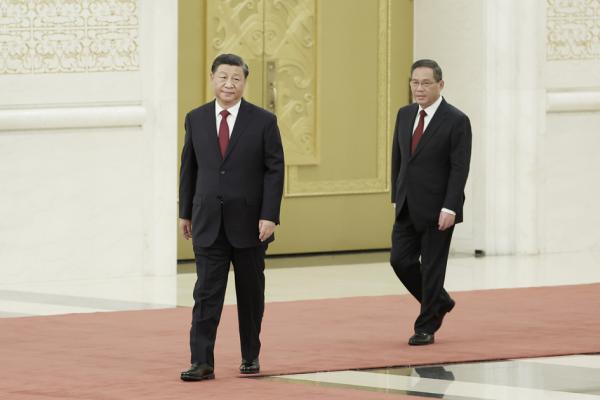 习近平与新任政治局常委李强（Lintao Zhang/Getty Images）