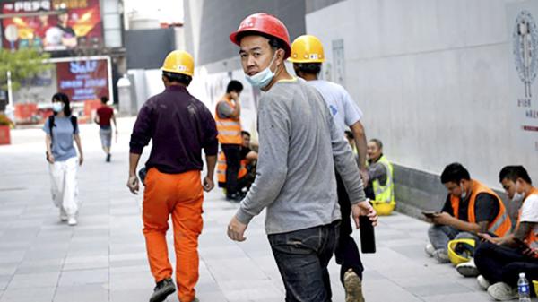 北京某建筑工地上的民工（Getty Images）