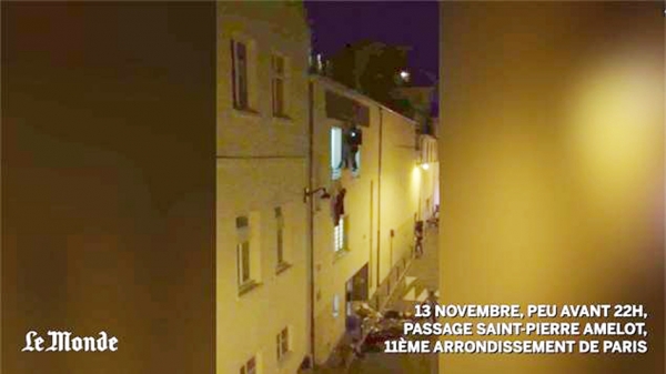 塞巴斯蒂安越过窗户去搭救吊在窗外孕妇的一幕被《世界报》（Le Monde）的记者抓拍到。（视频截图）