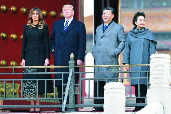 川普访问中国期间,川普夫妇与习近平夫妇的合影。(AFP/GETTY IMAGES) 川普访问中国期间,川普夫妇与习近平夫妇的合影。(AFP/GETTY IMAGES)