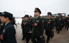 2026年3月5日，中共全国人大第四次会议在北京人民大会堂开幕，中共军委代表团抵达会场。（图片来源：Getty Images）