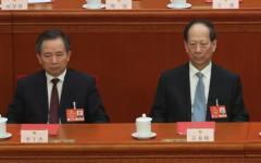 2025年3月11日，全国人民代表大会闭幕式现场。图为李干杰与石泰峰。 （图片来源：Lintao Zhang/Getty Images）