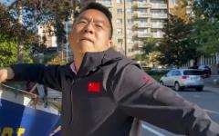 2026年9月22日上午，一名男子暴力毁坏多伦多中领馆前的真相横幅和展板，并发出死亡威胁。（视频截图/法轮功学员提供）