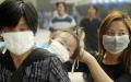 2003年中国爆发非典（SARS）疫情（图片来源:PETER PARKS/AFP/GettyImages）