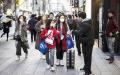 1月24日有中国游客行走在日本东京的大街上。（Getty Images）