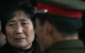 一位中国母亲在和参军的儿子告别时难忍眼泪。（图片来 源：China Photos/Getty Images）