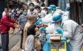 疫情在中国催生了又一个暴利行业：核酸检测。（图片来源：STR/AFP via Getty Images）