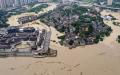 中国今年洪灾严重，多地成为水乡泽国，图为2020年8月19日的重庆灾区。（图片来源:Getty Images）