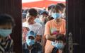 广州市宣布，启动荔湾、越秀、海珠、白云、番禺等区分级分类防控，用最短时间实现重点区域大隔离、大筛查。示意图。（图片来源：STR/AFP via Getty Images）