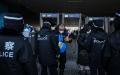 图为2022年2月4日警察在北京的一个检查站进行检查。（图片来源： Annice Lyn/Getty Images）