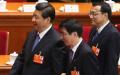 习近平、中共中央政治局委员王沪宁，以及李克强。