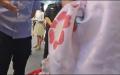 8月10日，江苏一女子穿和服拍照，遭警察盘查并被带走。（视频截图）