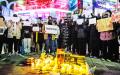 2022年11月30日，抗议者在韩国首尔举行声援集会。（ANTHONY WALLACE/AFP VIA GETTY IMAGES）