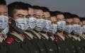 2020年10月23日，中共军队士兵们在天安门列队参加纪念朝鲜战争70周年的活动。（图片来源：Kevin Frayer/Getty Images）