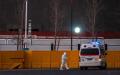 近期中国疫情肆虐，官方始终低调处理大批死亡案例。示意图。（图片来源：Kevin Frayer/Getty Images）