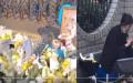 武汉一小学校内教师驾车撞死1名孩子后，孩子母亲疑遭警察粗暴执法再跳楼死。（图片来源：视频截图）