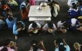 重庆川南区一乡镇小学餐厅学生在用餐。（图片来源：Getty Images）