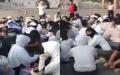 河南洛阳一高、二高教师们罢课集体讨薪、静坐抗议。（图片来源：视频截图）