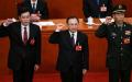 图为2023年3月12日，新当选的国务委员秦刚（左）、李尚福（右）在中共全国人大五次会议上宣誓。如今这2人都下落不明。