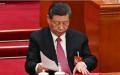 “世界公民法院”的人民法庭，将在7月8日至12日，审理习近平犯下的“侵略罪和反人类罪”。图为习在第十四届全国人民代表大会闭幕会议上收起文件。