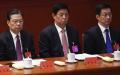 上海市委书记、政治局委员韩正（右）与中央书记处书记、中央办公厅主任、中央政治局委员栗战书（中）、中央政治局委员赵乐际（左）在北京人民大会堂出席中国共产党第十九次代表大会闭幕式。（图片来源：WANG ZHAO/AFP via Getty Images）