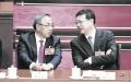 2023年3月，胡春华（左）、陈吉宁（右）在北京出席两会。（LINTAO ZHANG/ GETTY IMAGES）