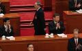 2025 年 3 月 5 日，国务院总理李强、中共党魁习近平（右）和常委王沪宁（左）在全国人民代表大会开幕式。(图片来源：Kevin Frayer/Getty Images）