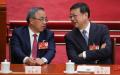 胡春华（左）、陈吉宁代表出席2023年3月11日在中国北京举行的全国人民代表大会第四次全体会议开幕。（图片来源：Lintao Zhang/Getty Images ）